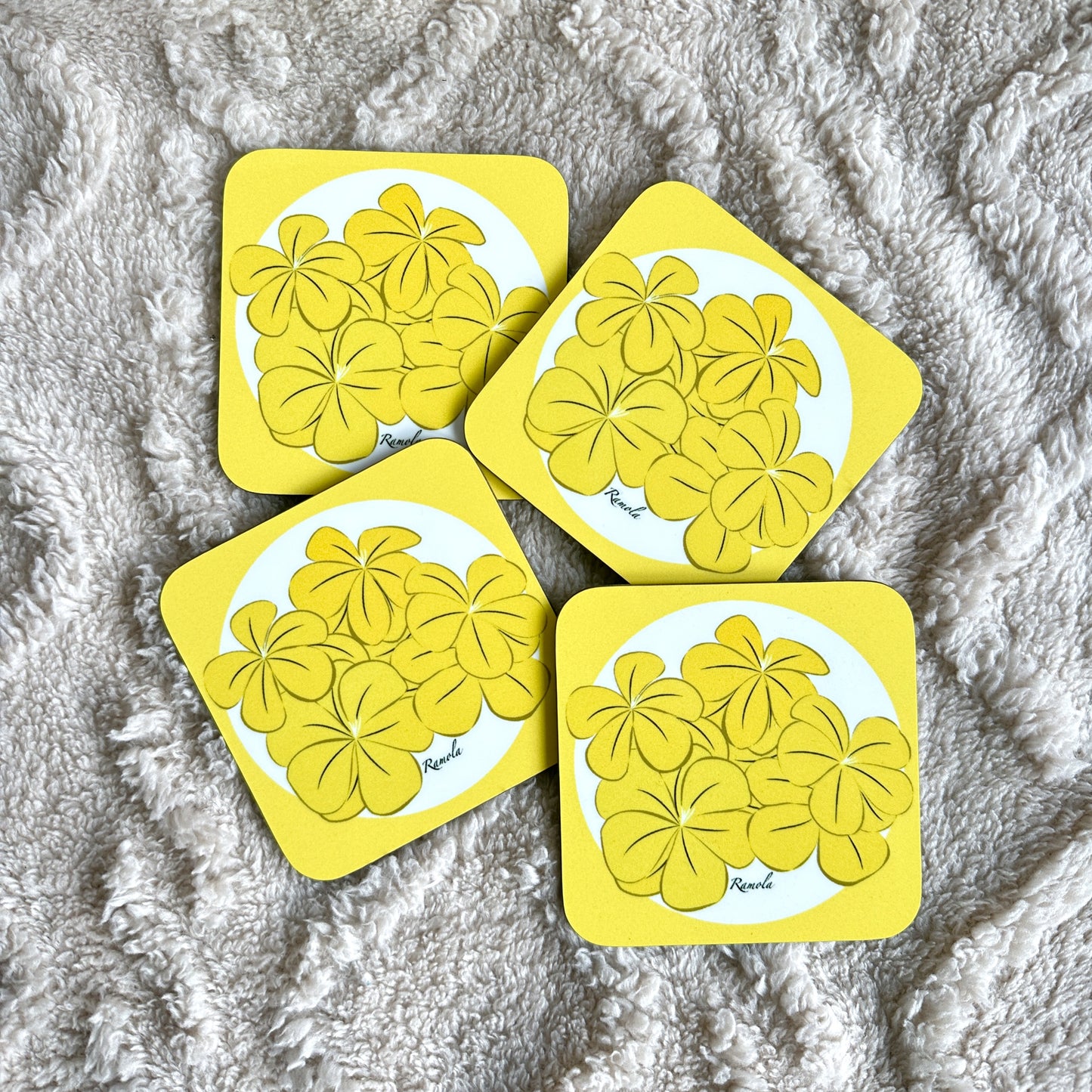 Yellow floral coasters in set of 4. High quality with vibrant illustrations.